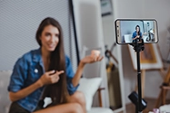 UGC creator filming on phone